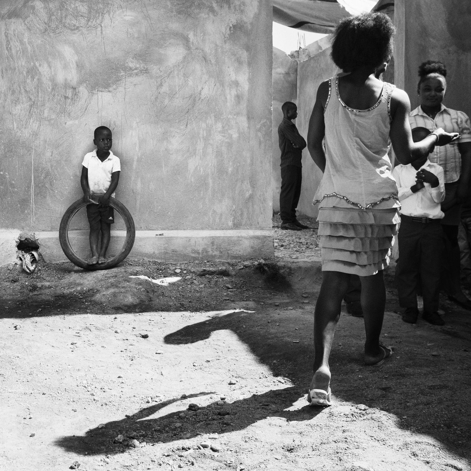Child with bicycle tire
