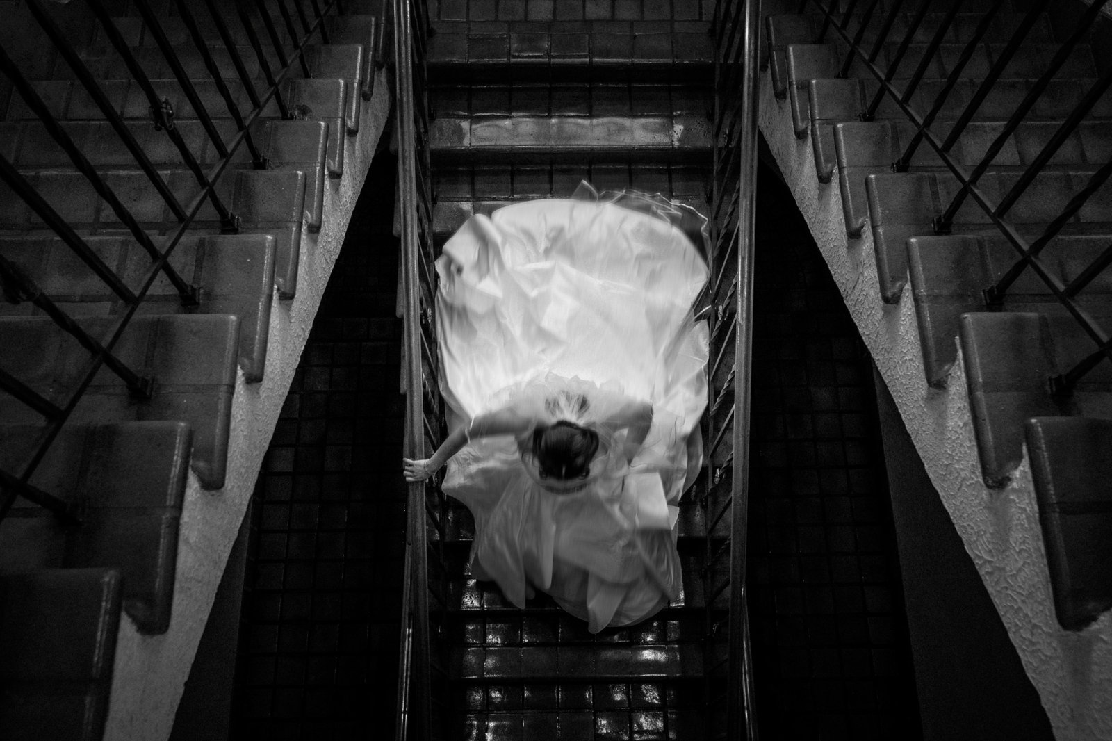 Bride on stairs from above